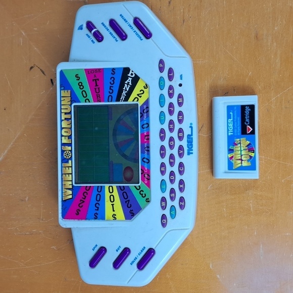 Vintage 1999 Tiger Wheel of Fortune hand held electronic game show game Tested - Picture 1 of 11
